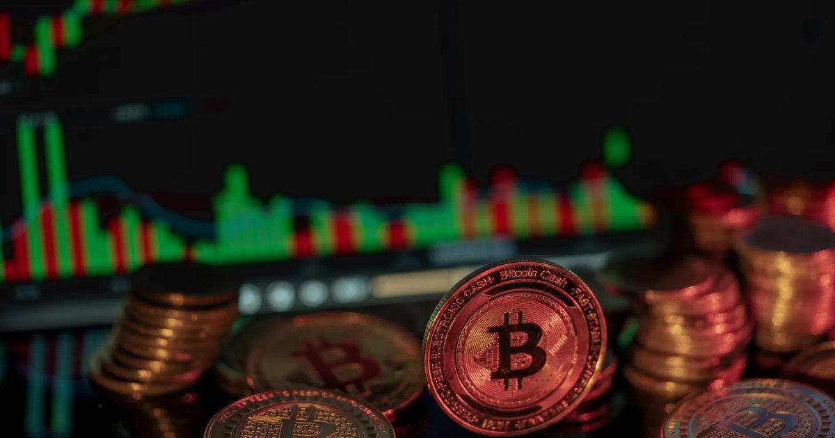 Bitcoin coins in front of a financial market chart, illustrating digital investment trends.
