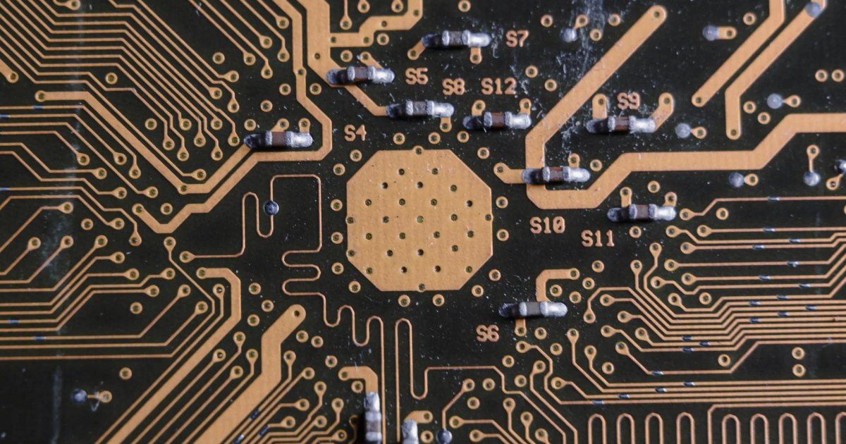 Detailed image of a printed circuit board highlighting electronic pathways and components.