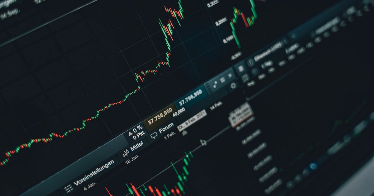 Close-up of stock market trading screen displaying financial growth and charts.