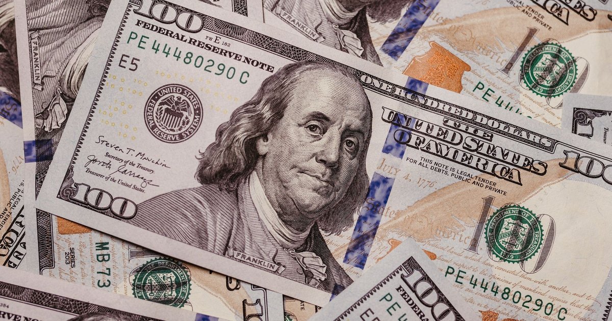 High-resolution image displaying a variety of US dollar banknotes in focus, symbolizing finance.