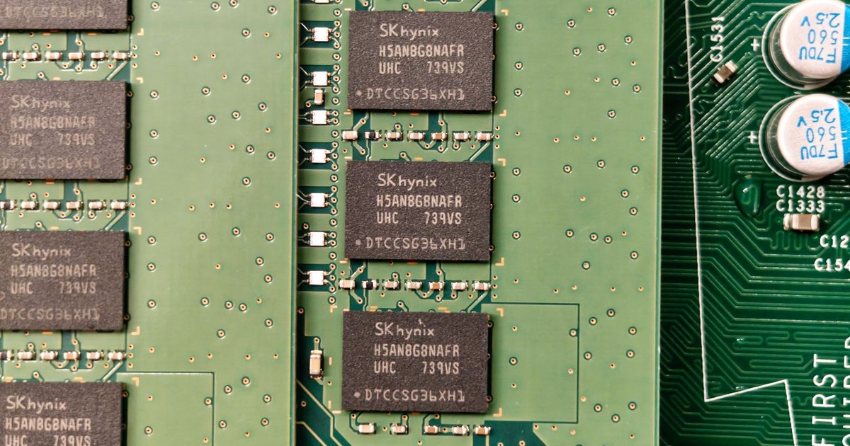 Detailed view of a green circuit board with SK hynix chips, showcasing electronic components.